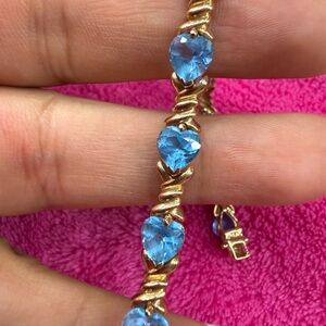 14k solid gold bracelet with blue topaz hearts